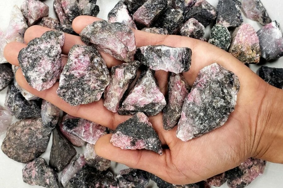A handful of Rhodonite found while gem hunting in Alaska
