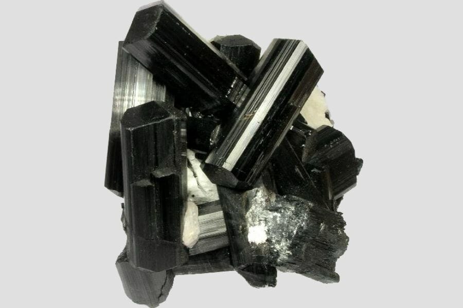 An intricate black Schorl with hints of greenish hue