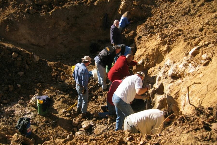 A group of people mining for gems at Columbia Mine