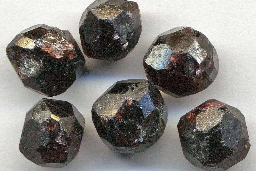Six pieces of reddish black Almandine Garnets