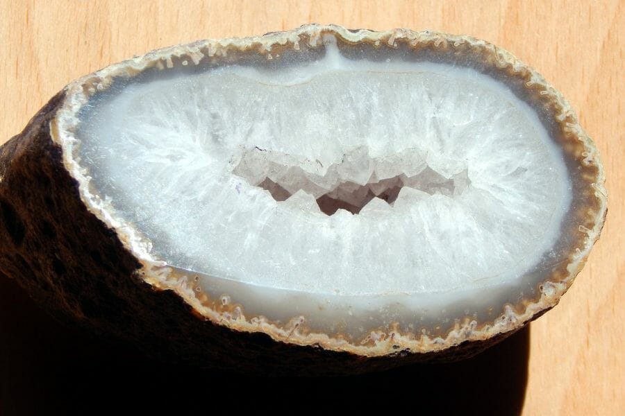 White quartz geode that is almost completely filled