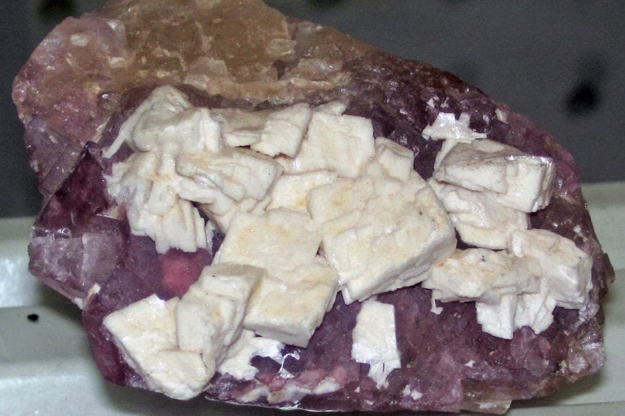 White Barite attached to a violet Fluorite