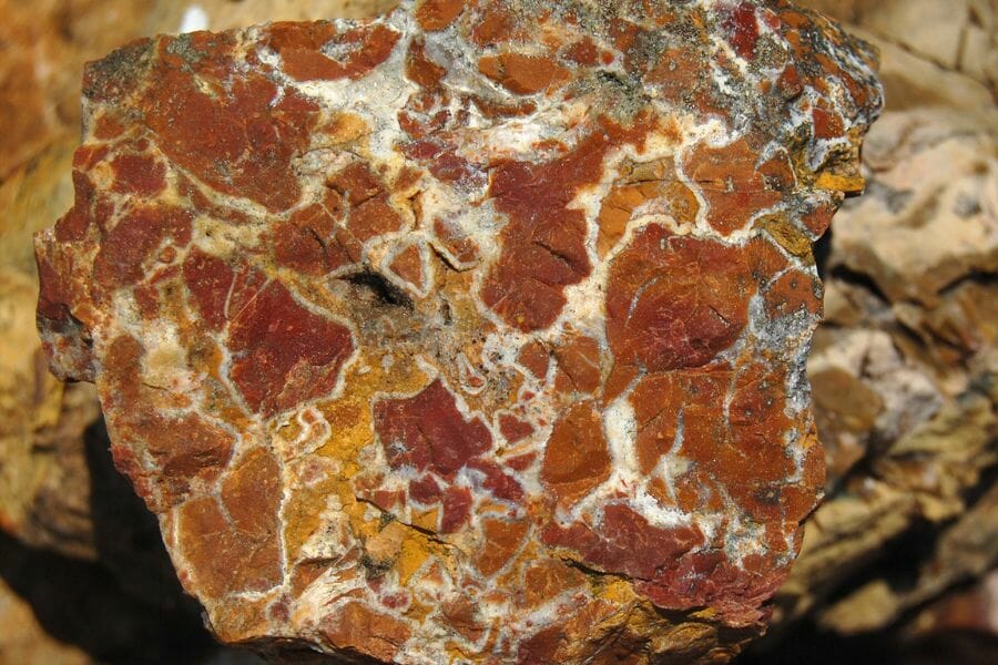 Traces of red Jasper found attached to a rock