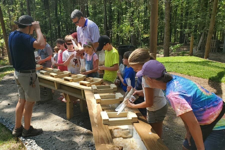 Kids learning all about gemstones and gem mining at the Dark Woods Adventure Park