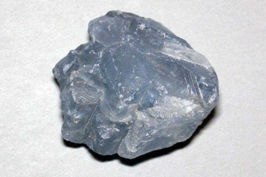 A bluish gray Celestite on a cemented surface