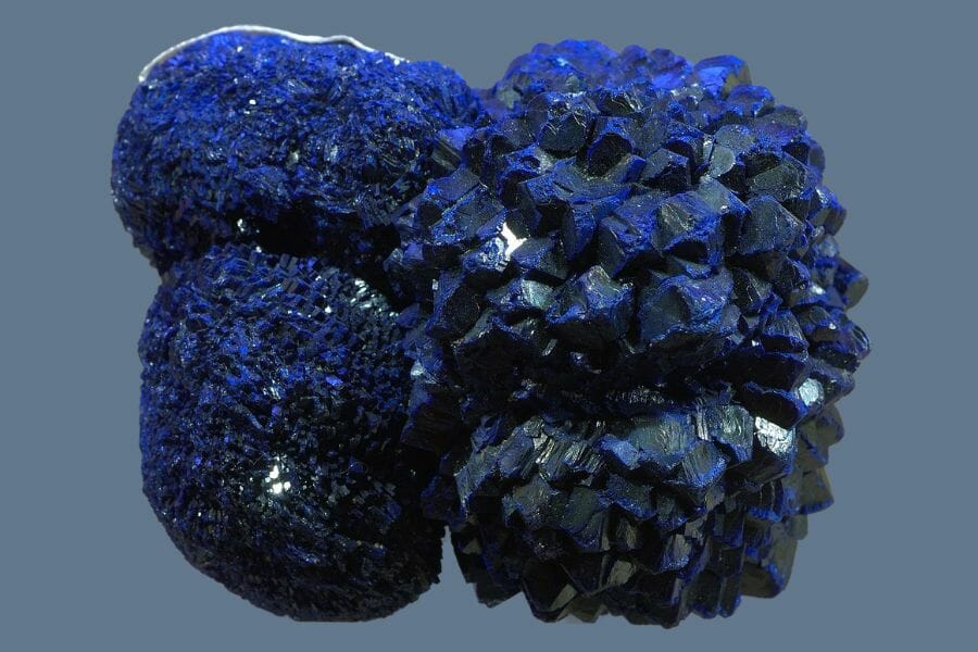 A big, royal blue Azurite against a light blue background