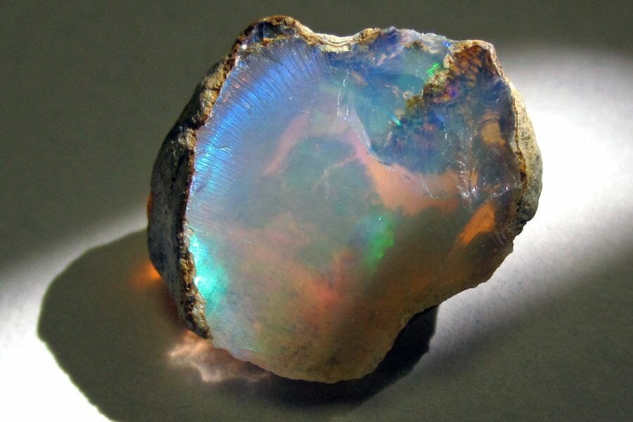 An Opal casting rainbow colors as white light hits it