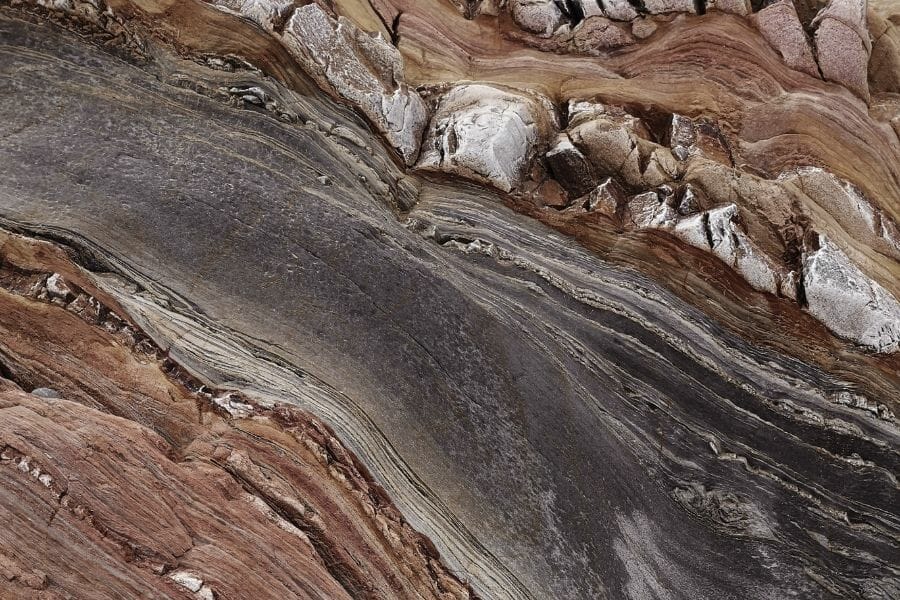 Veins in rock that may hold raw gems
