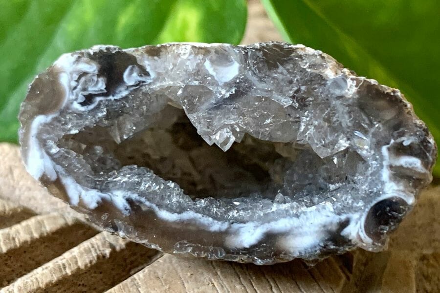A unique agate geode on a wooden surface