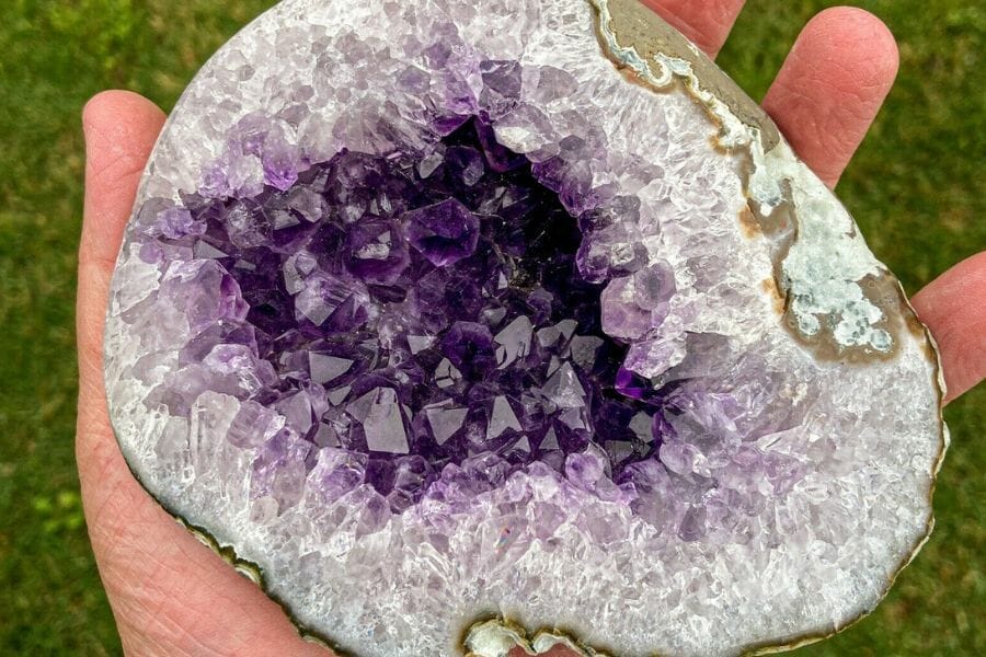 A beautiful amethyst geode with a size as big as a hand