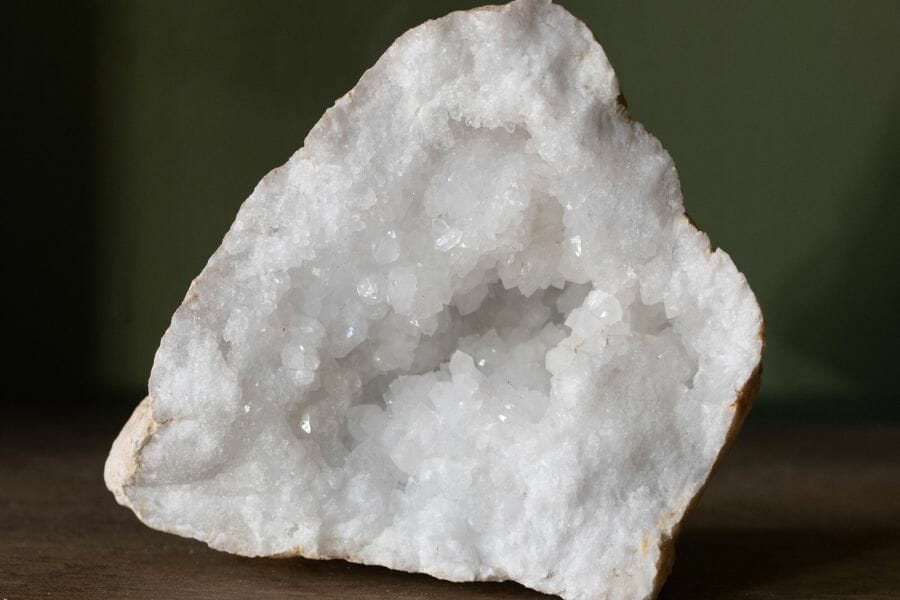 An elegant calcite geode sitting on a table