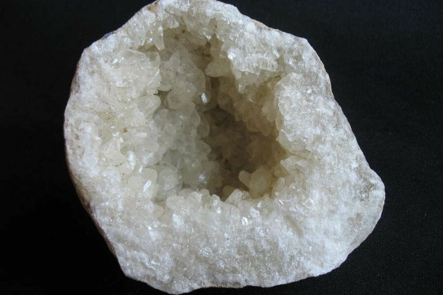 A mesmerizing quartz geode with a black background