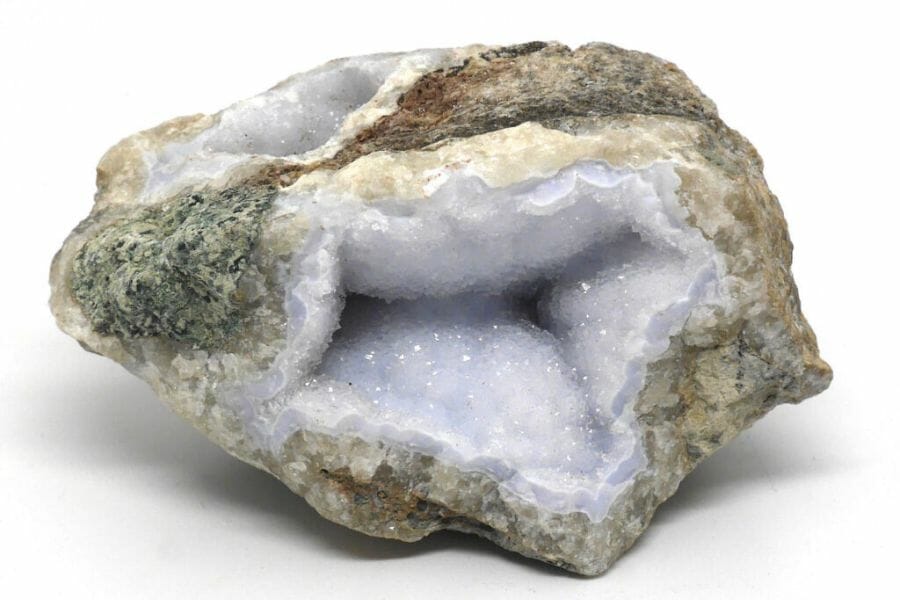 A mesmerizing chalcedony with sparkling crystals inside and is barely cracked open