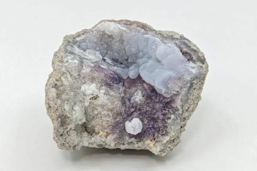 A gorgeous chalcedony geode with light blue and purple hues