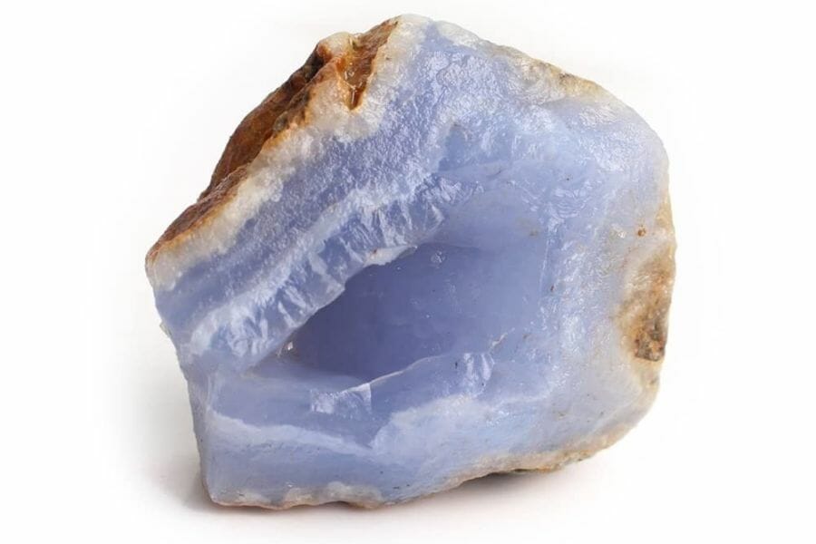 A stunning blue chalcedony geode with a very smooth surface