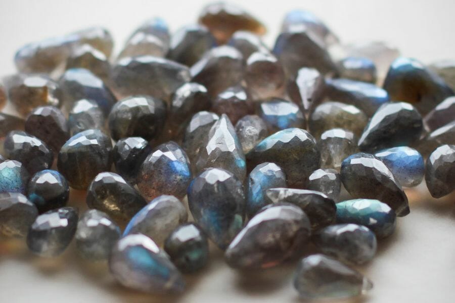 Small, polished pieces of gray Labradroite with bluish hues