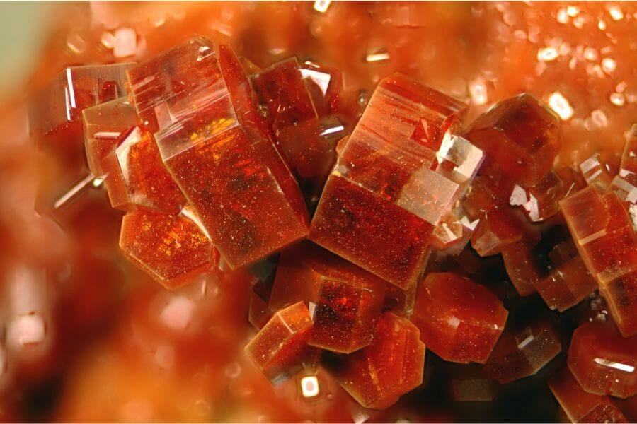 A close look at the cubic formation of shimmering orange Vanadinites