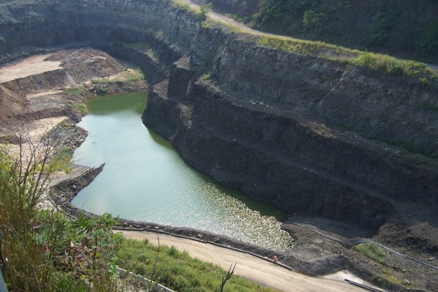 A large quarry in Passaic County with a lake in the middle