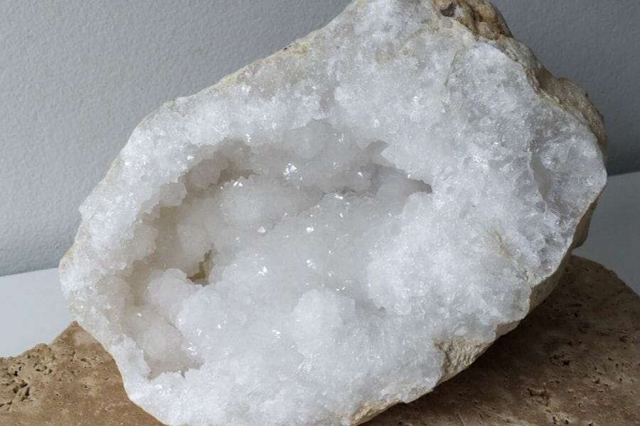A stunning quartz geode with white bubble-like crystals inside