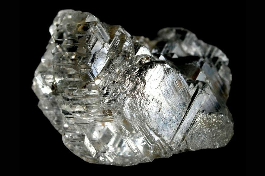 A beautiful, lustrous silver Alabandite with black background