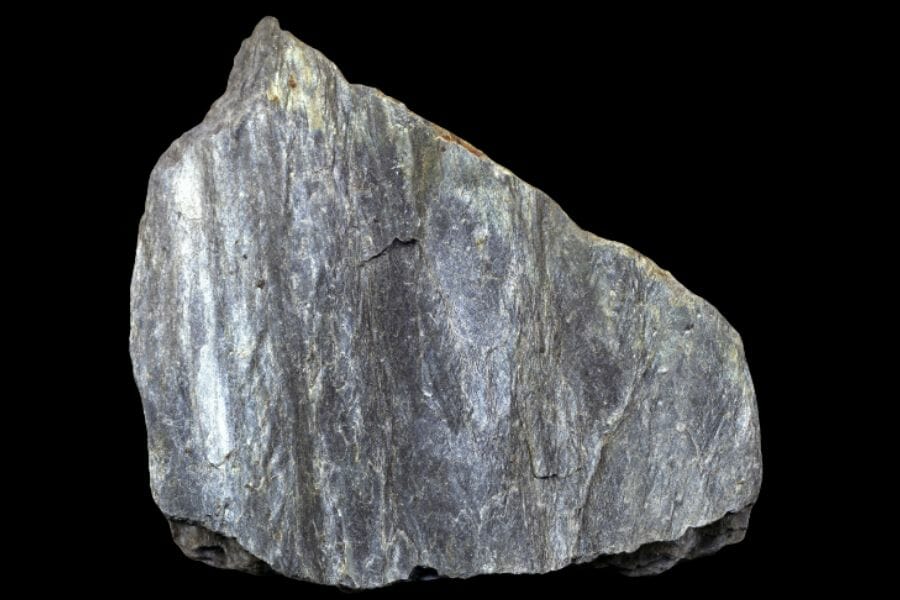 A ragged piece of silver Phyllite