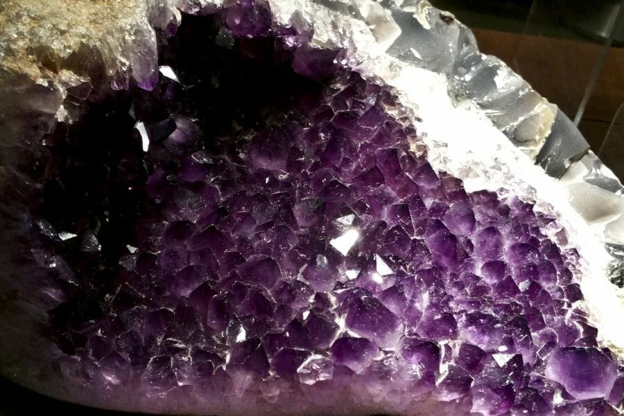 A close up look at the crystals of an amethyst geode