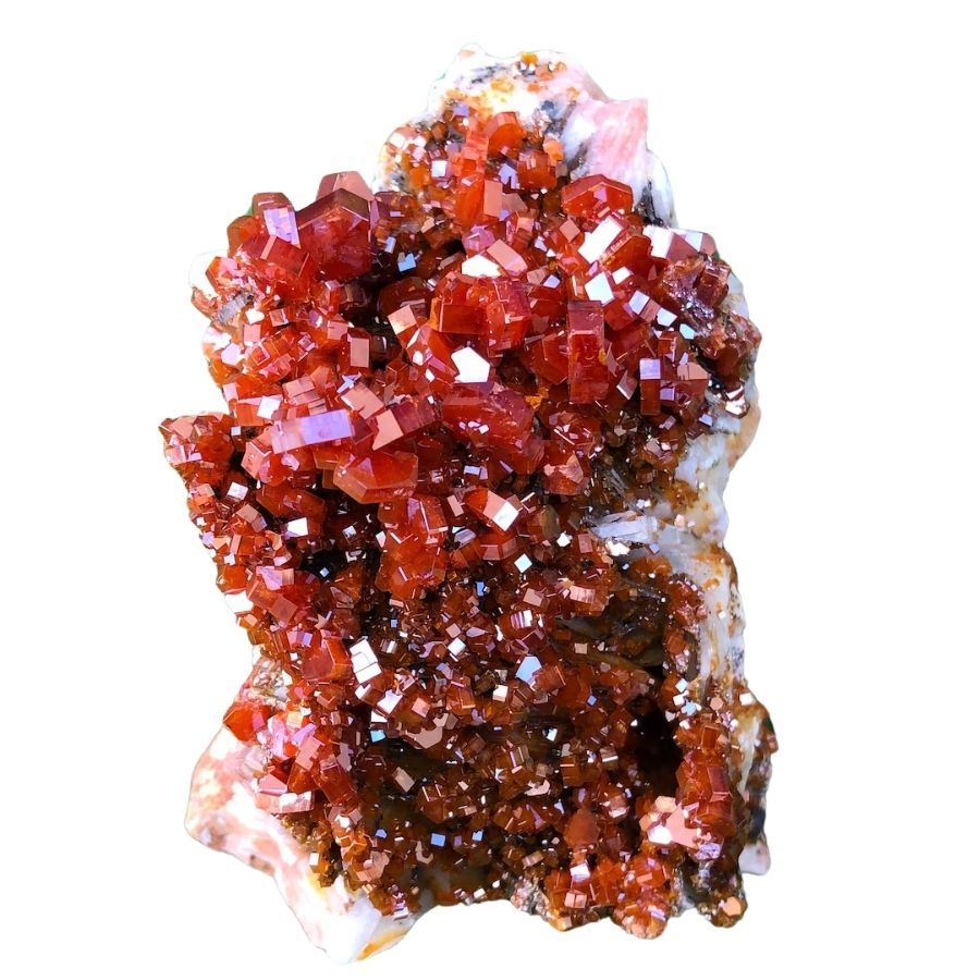 red lustrous vanadinite crystals on a rock