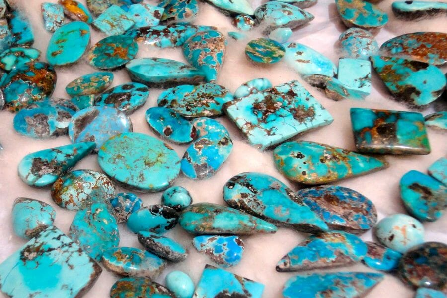 A bunch of differently shaped candy blue Turquoise crystals