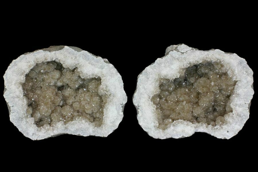 Two sides of an open geode showing smoky gray crystal formations