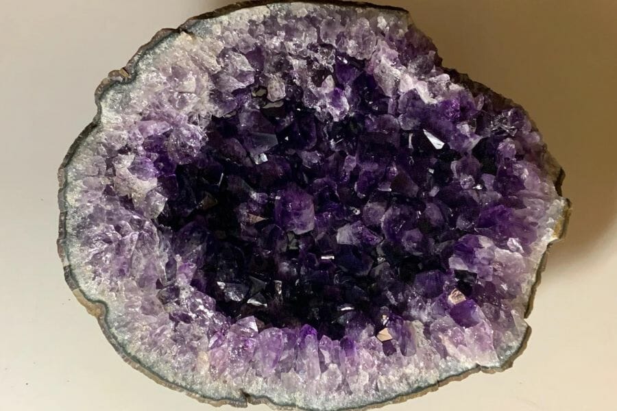 A stunning amethyst geode with a perfect circular shape