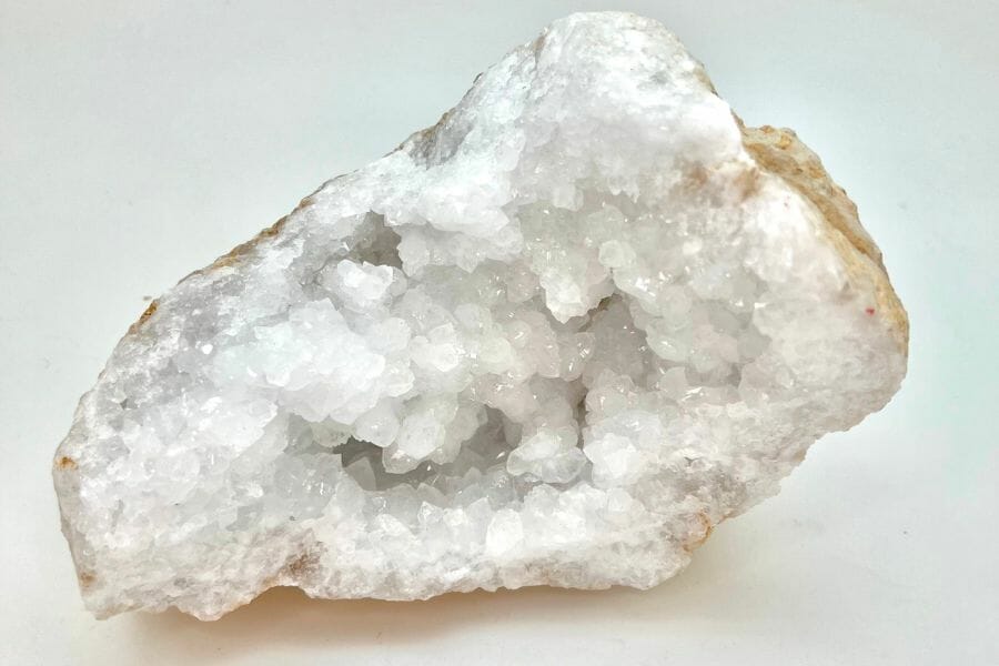 An open geode with sparkling white crystals