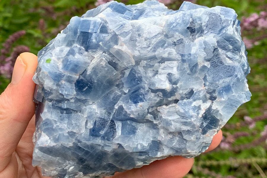 An elegant calcite with different blue hues and white patches