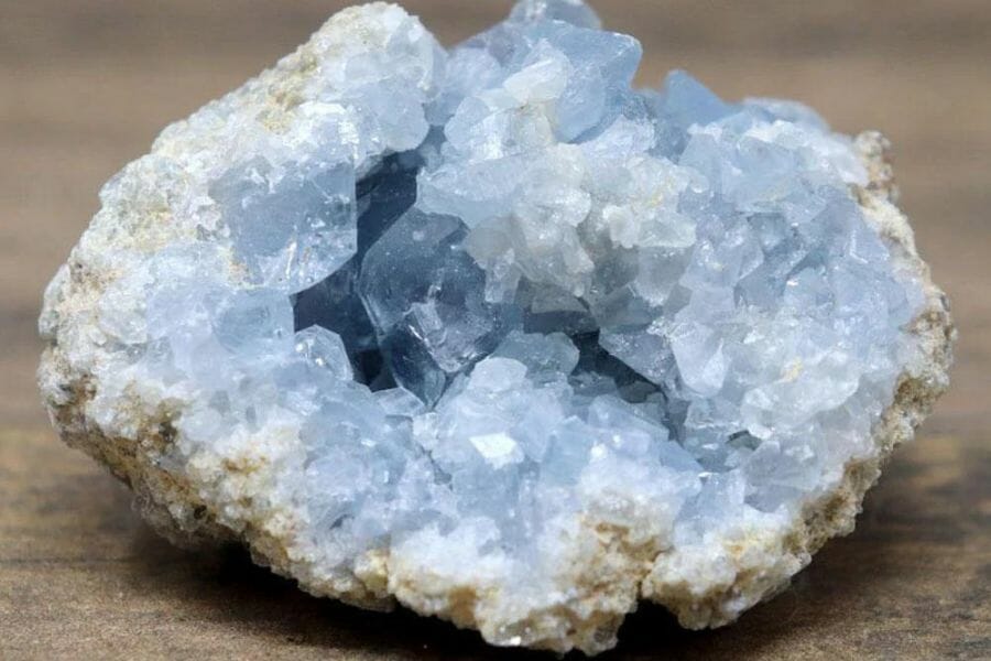 A gorgeous celestite on a wooden surface