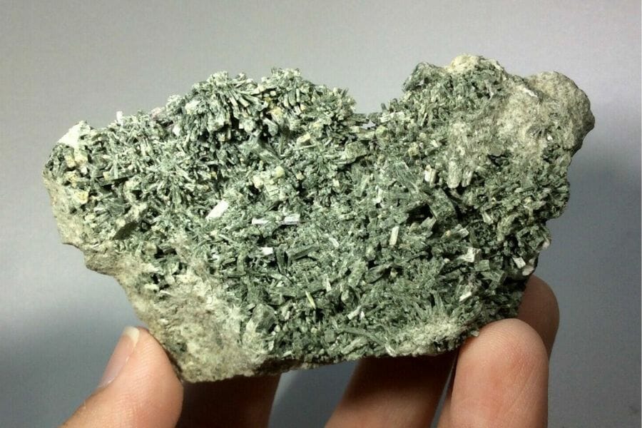 A gorgeous epidote with a rough surface and irregular shape