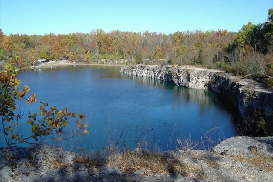 a picturesque view of an area at France Stone Co Quarry with a nice lake in the middle