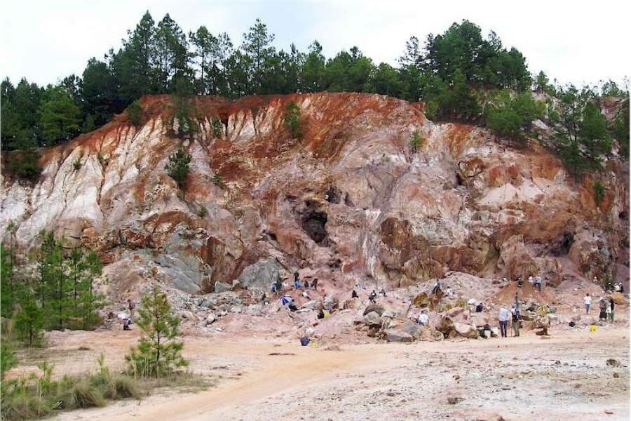 A view of the cutout at Graves Mountain and rockhounds searching for crystals