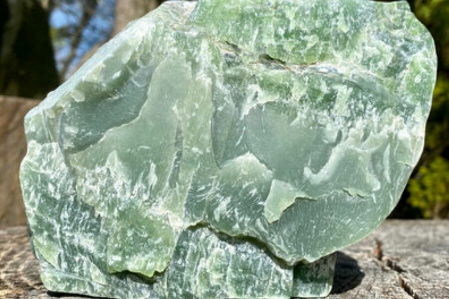 An enormous jade with white streaks and an irregular shape