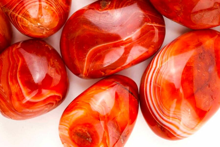 Pieces of beautiful orange Carnelian with interesting white patterns
