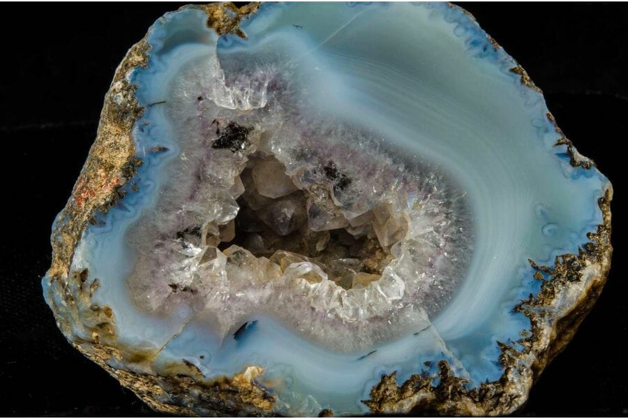 A beautiful sample of an open geode showing blue and white crystals