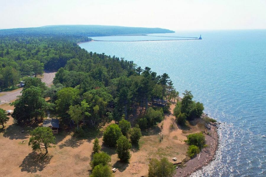 A bird's eyeview of the McLain State Park showing its forested and seaside areas