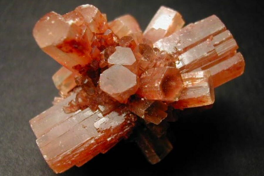 A piece of beautiful orange Aragonite crystals