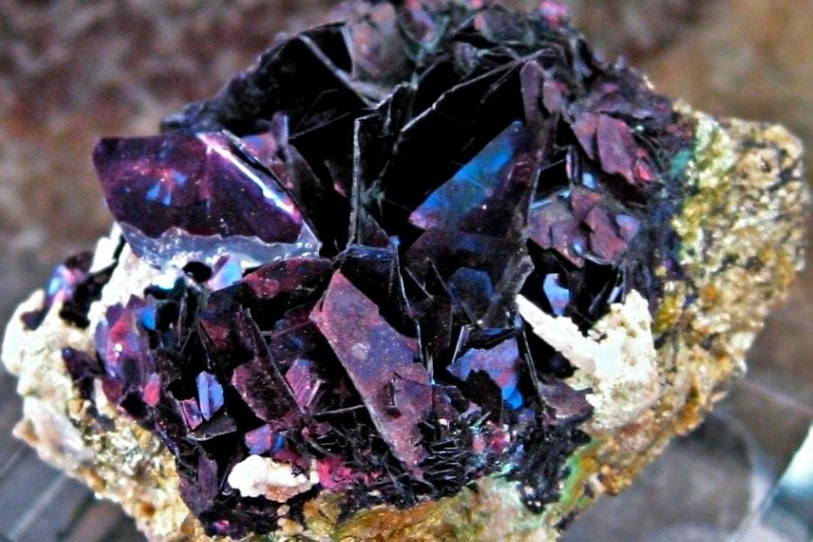 A sparkling sample of a purplish black Covellite crystals
