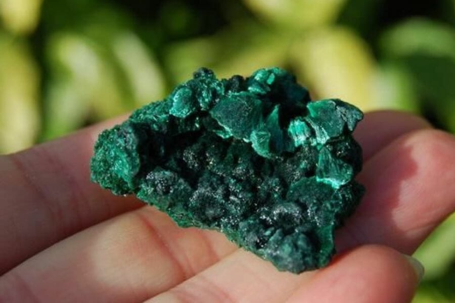 A pretty small green malachite with a unique irregular shape
