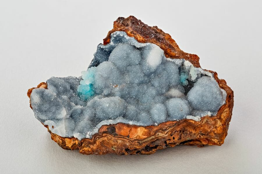 Interesting look at the Limonite and Quartz crystals of an open geode