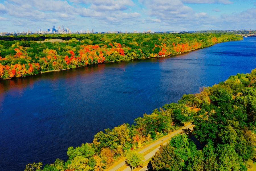 A picturesque view of the Mississippi River and it's lush and vibrant surroundings