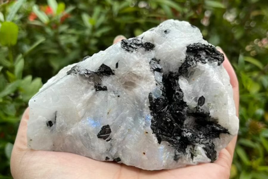 A gorgeous huge moonstone crystal with black patches