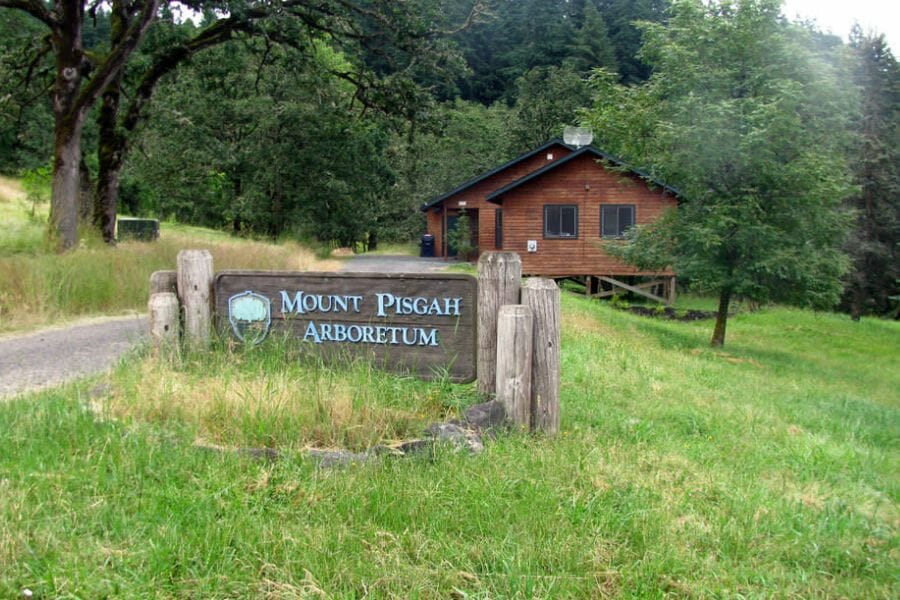 Mount Pisgah Arboretum entrance sign where you can look for crystals