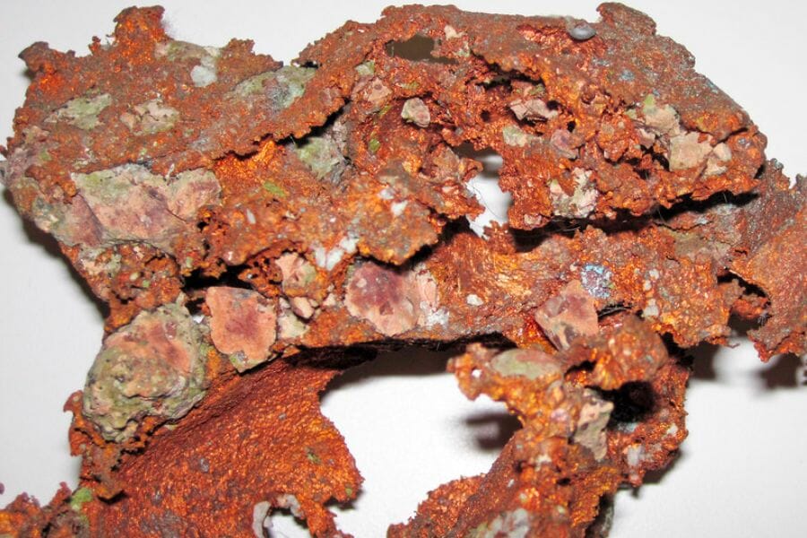 An intricately-shaped orange-red Copper crystal