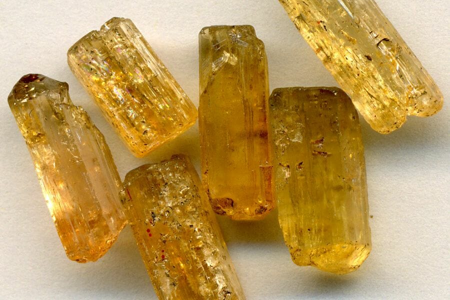 A bunch of translucent yellowish-brown Topaz crystals