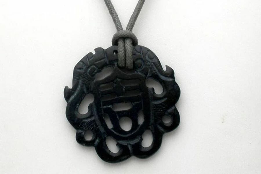 Carved black jade necklace